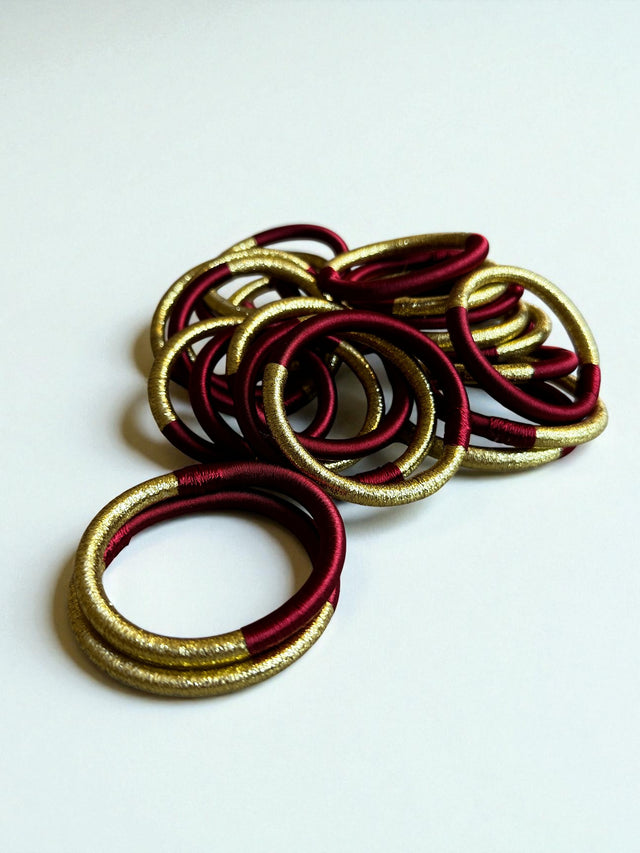 Armreif - bordauxrot-gold