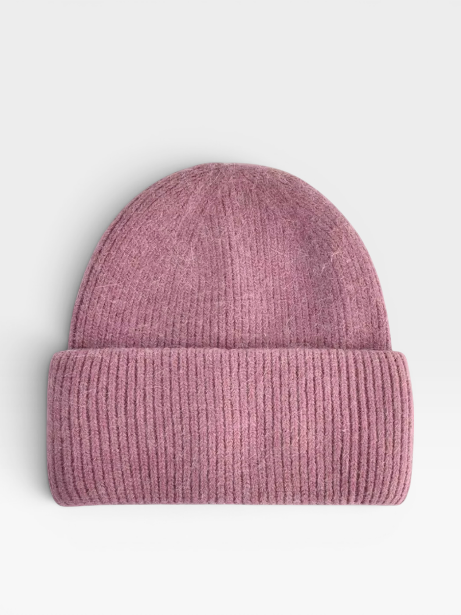 LEY! Wollmütze „Saha“ in Pink, mit breitem Umschlag, ideal als Beanie für Damen und Herren, vor weißem Hintergrund.