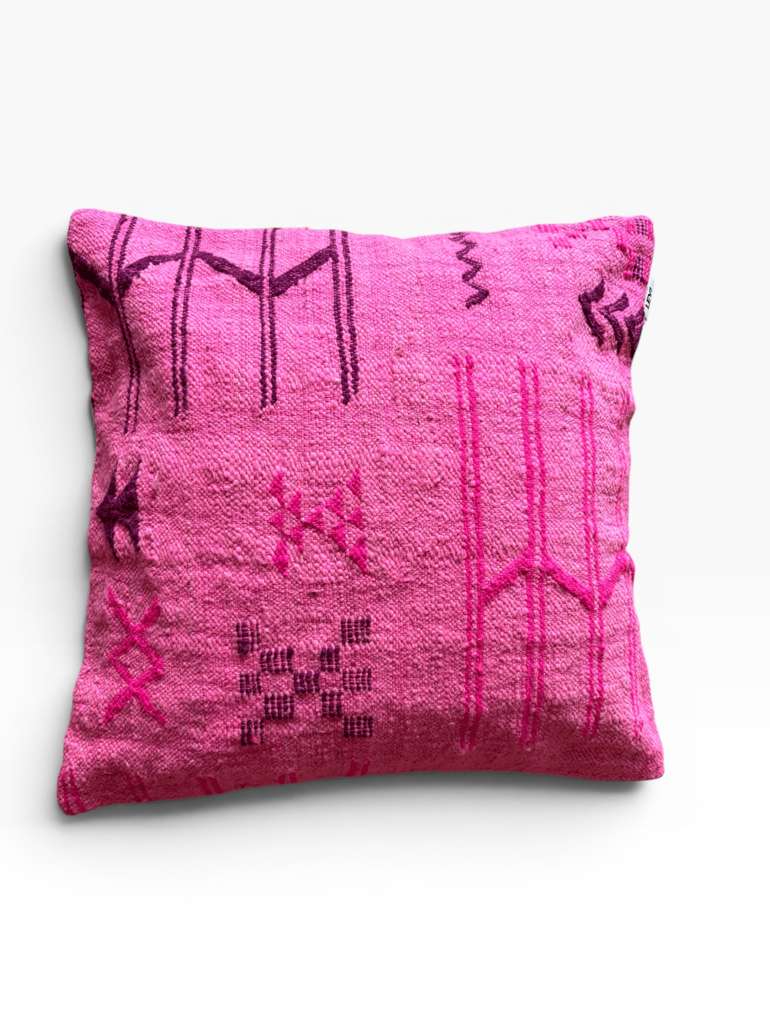 LEY! Kissen – Colorful Line – Pink Edition 60x60: Quadratisches rosa Kissen mit geometrischen Mustern in Lila/Magenta auf weißem Hintergrund.