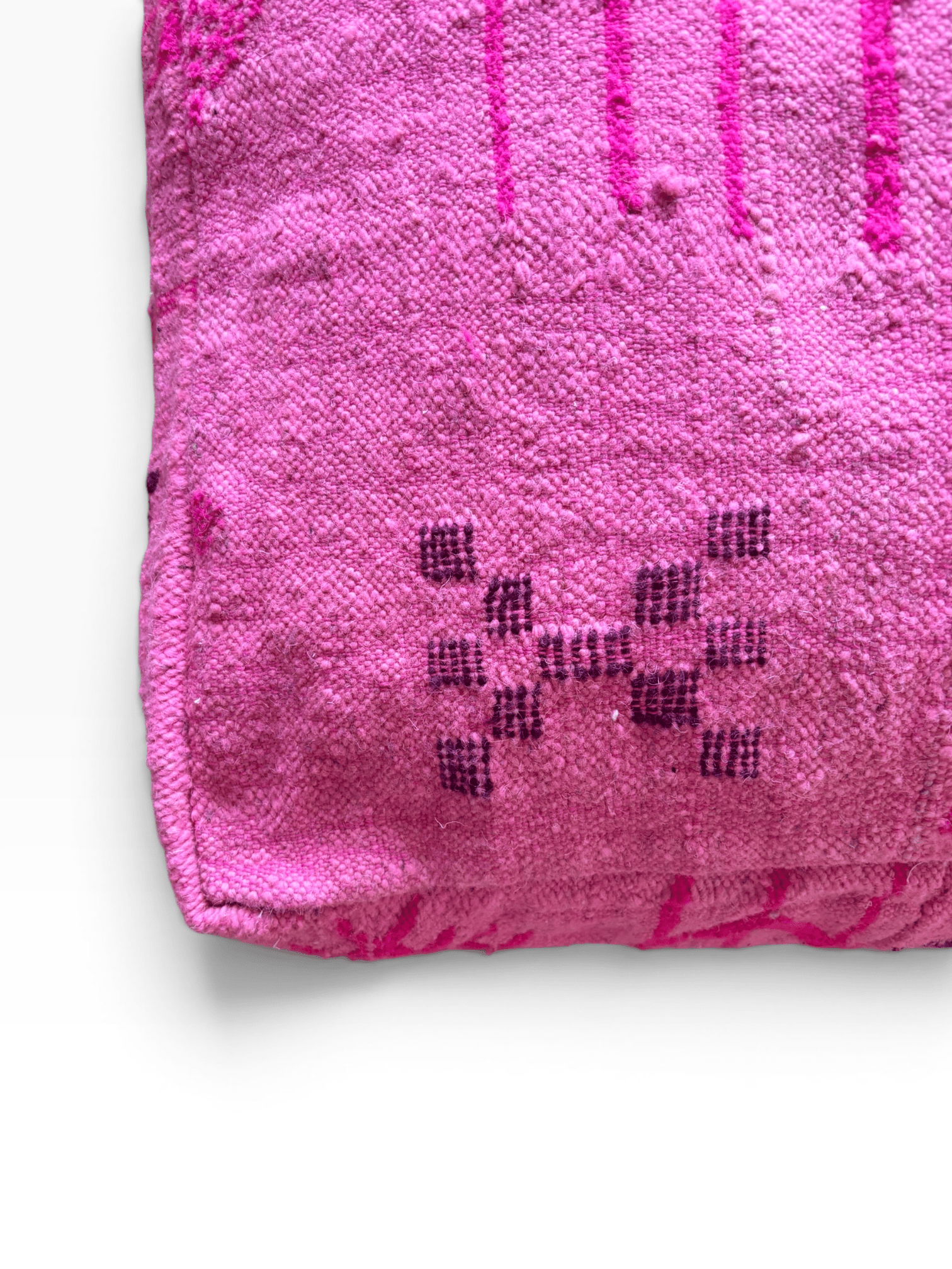Das LEY! Bodenkissen – Colorful Line – Pink Edition besticht durch lebhafte Muster auf weißem Hintergrund.